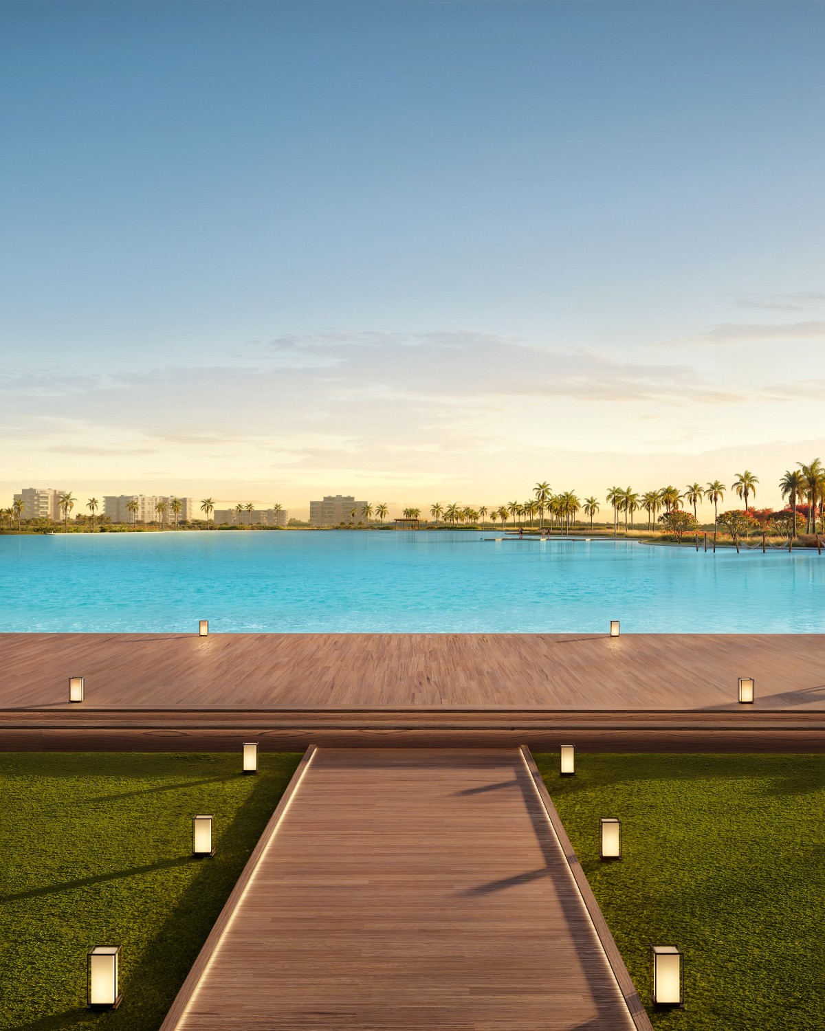 Deck de madeira sobre a lagoa cristalina do Heritage Riviera ao pôr do sol